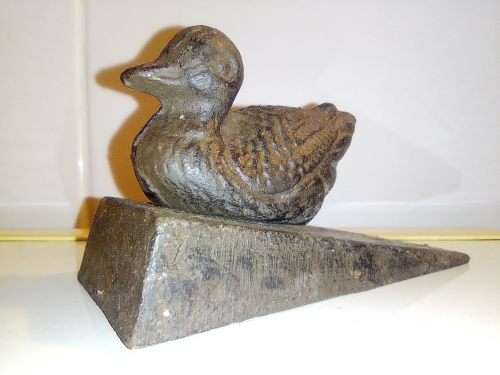 A Collectible Cast Iron Duck door stopper.