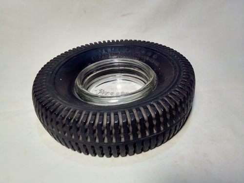 A Old Firestone tyre ashtray. In good condition for it`s age