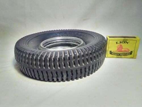 A Old Firestone tyre ashtray. In good condition for it`s age