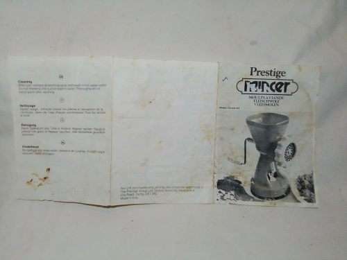 In Good working order. Original box. Prestage Mincer made in ITALY. hand driven, table suction.