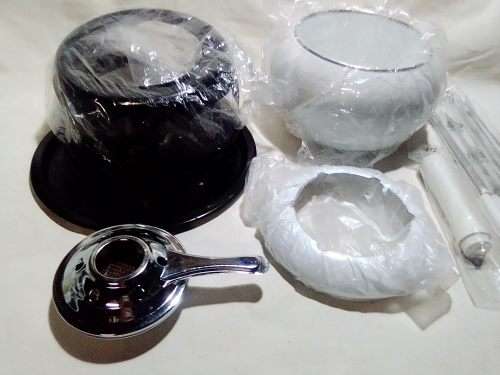 Brand New and clean. An Estate find, a German, Complete and boxed white enamel Fondue.