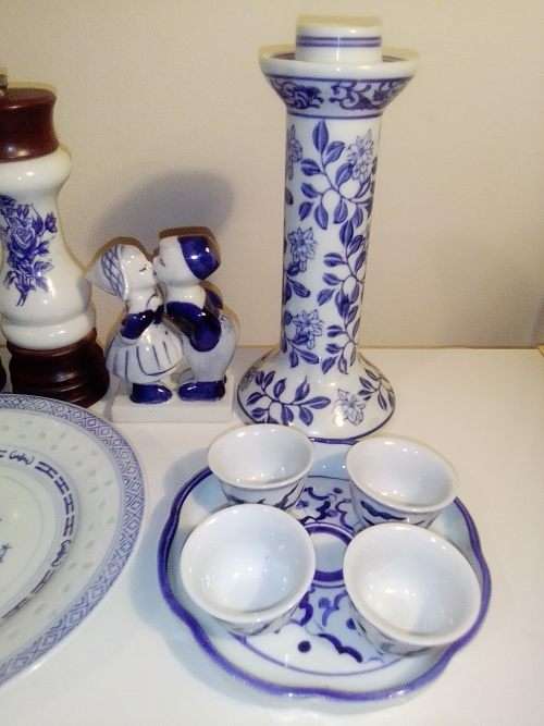 A Pepper Mill, Blue Delft waer Boy/Girl figurine. 10 blue items, Candle Stick, Sakki Cups+ Tray.