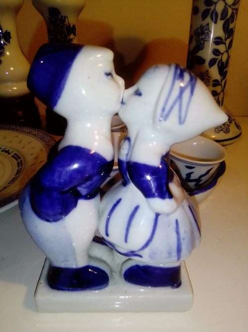A Pepper Mill, Blue Delft waer Boy/Girl figurine. 10 blue items, Candle Stick, Sakki Cups+ Tray.