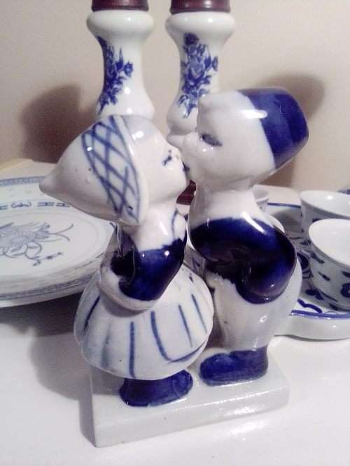 A Pepper Mill, Blue Delft waer Boy/Girl figurine. 10 blue items, Candle Stick, Sakki Cups+ Tray.