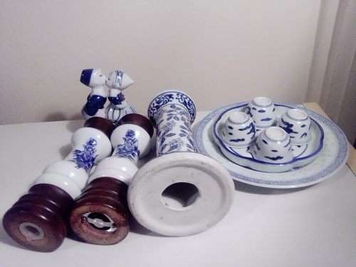 A Pepper Mill, Blue Delft waer Boy/Girl figurine. 10 blue items, Candle Stick, Sakki Cups+ Tray.
