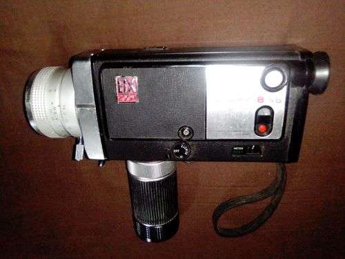 Collectible, Old Vintage Working Minolta Autopak-8 S6. movie camera in case with Booklet.