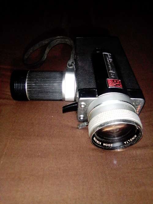 Collectible, Old Vintage Working Minolta Autopak-8 S6. movie camera in case with Booklet.