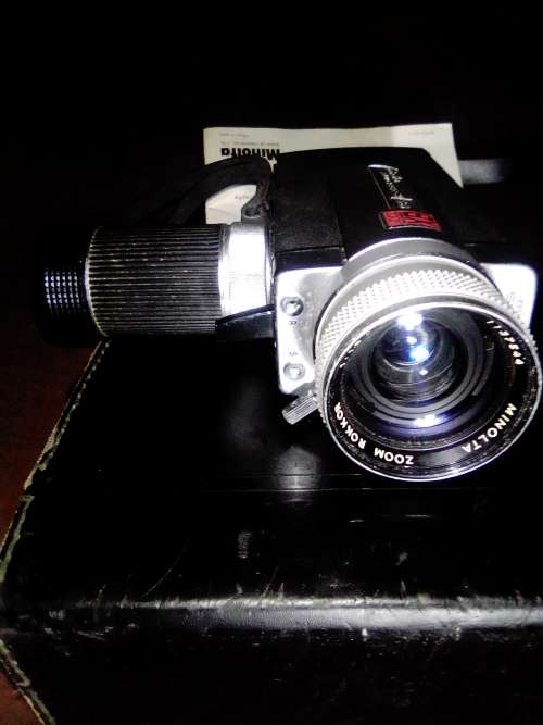 Collectible, Old Vintage Working Minolta Autopak-8 S6. movie camera in case with Booklet.