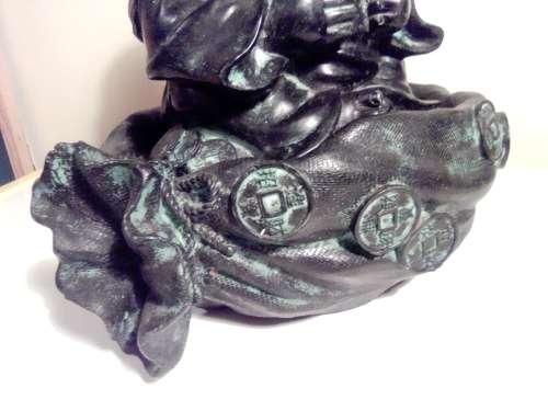 Large Green Buda with (We Think) ceramic?  bowl sitting on a money bag. In good condition.