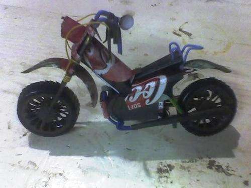 A Hand made of Coca Cola Can's a 4Cyl Motor Cycle 175mm L X100mm H Post 48 + 2% Insurance .