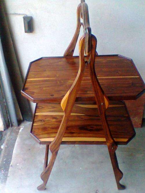 A colapsable Tambotie 2 Tear CAKE Stand for easy storeing. Postage R125.00 + 2% Insurance if require