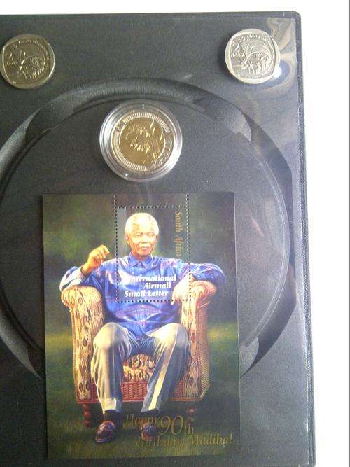 Mandela: R5 UNC 90th Birthday Capsulated coin and sitting stamp, 2 x R2 ten years of freedom coins