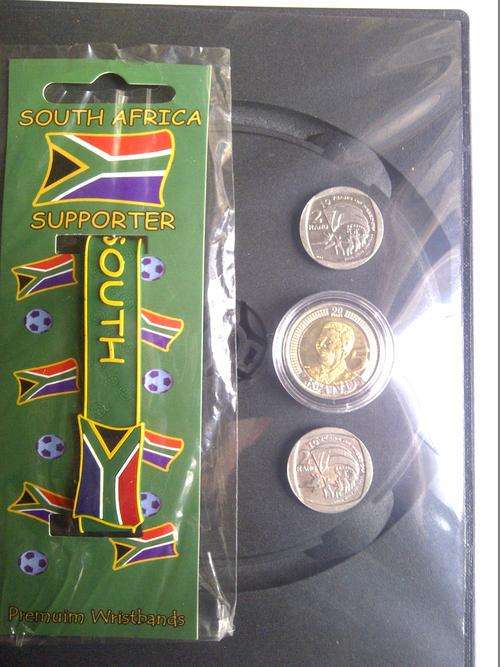 Mandela- 90th Birthday UNC R5 Coin, 2 x ten years of freedom R2 Coins - Supported wrist band
