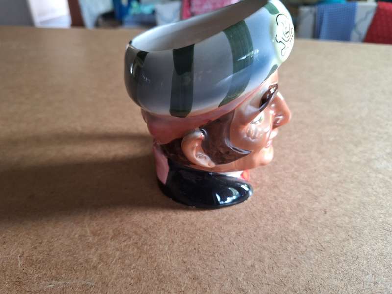 Vintage face shaped cup
