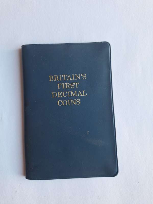 British first decimal coins in holder