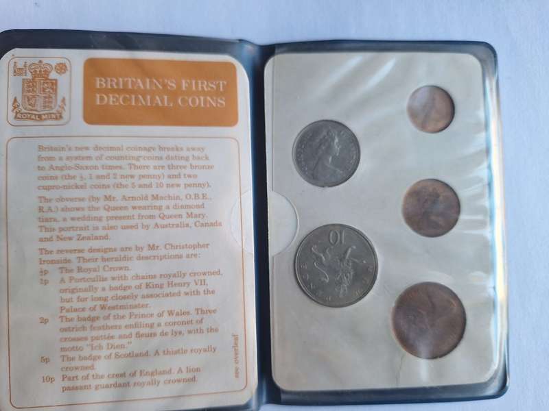 British first decimal coins in holder