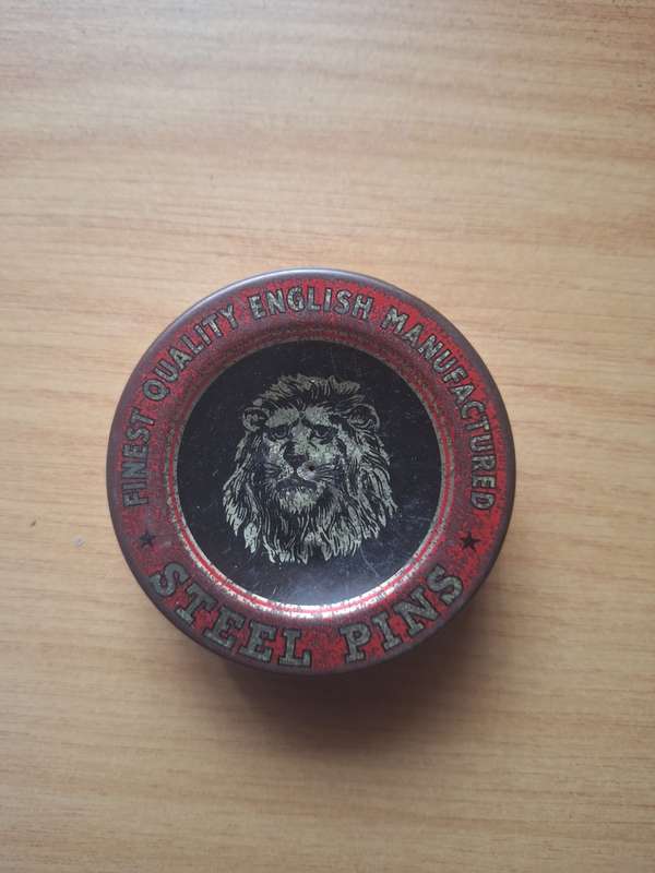 Vintage lion steel pin empty can