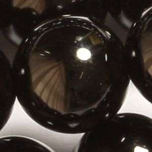Natural onyx beads: average of  6mm each