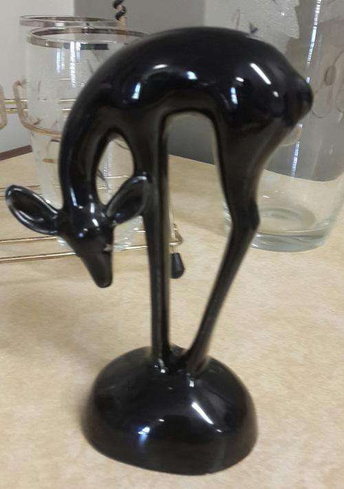 Black porcelain figurine of deer