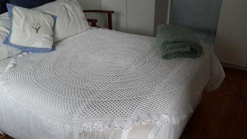 Beautiful big round  crochet tablecloth  in white - big enough to use on double bed as throw
