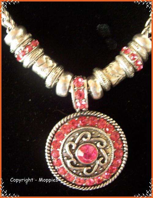 Tibetian silver chain and round pink pendant