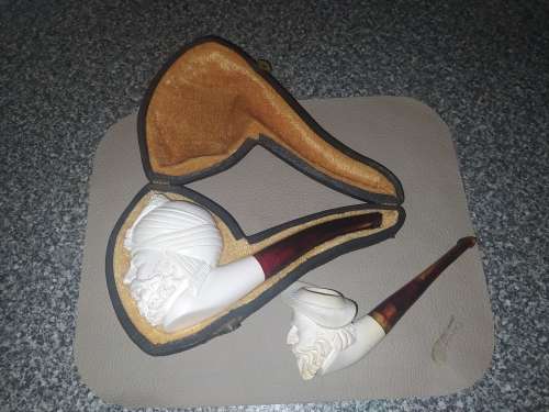 Unknown `carved face` smoking pipes