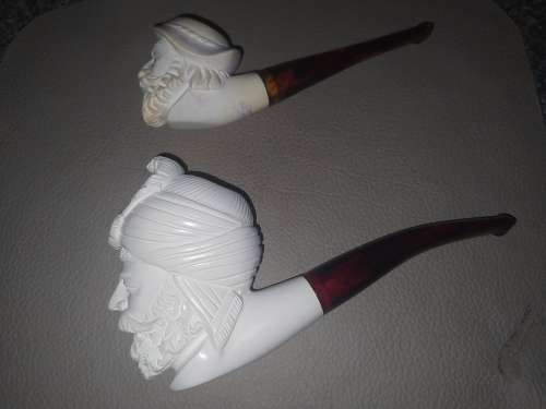 Unknown `carved face` smoking pipes