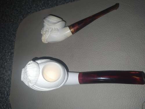 Unknown `carved face` smoking pipes
