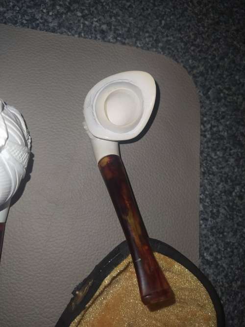 Unknown `carved face` smoking pipes