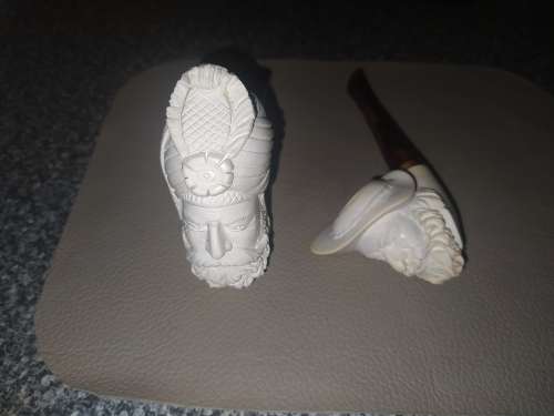 Unknown `carved face` smoking pipes