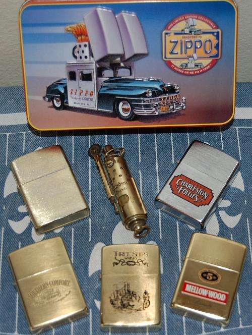 3 X Zippo Lighters, 2 X Zippo Look-alikes, 1 X Klipdrift Brandy.