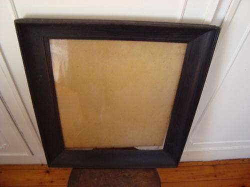 WOODEN PICTURE FRAME GLASSED.  VINTAGE.  Buyer collects......