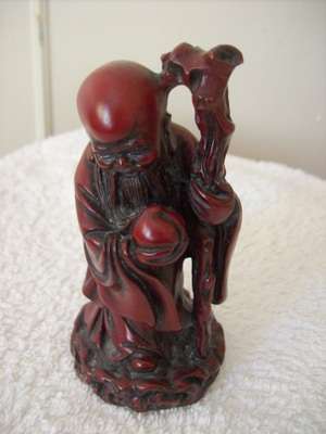ORIENTAL MAN STATUE