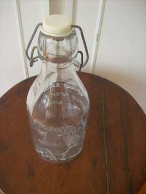 MILK BOTTLE.   VINTAGE.