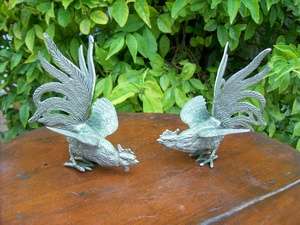 A BEAUTIFUL PAIR OF METAL FIGHTING COCKS