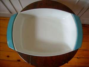 A  LARGE ENAMELLED CAST IRON CASEROLE DISH