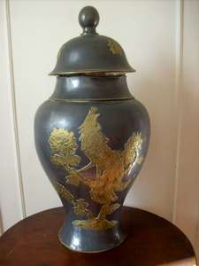 A LARGE PEWTER URN/VASE