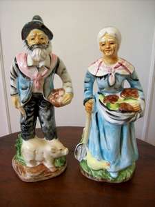 A BEAUTIFUL PAIR OF PORCELAIN STATUES