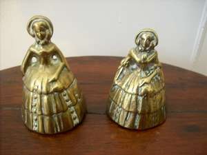 PAIR OF BRASS BELLS.  WOMEN IN PERIOD DRESS.