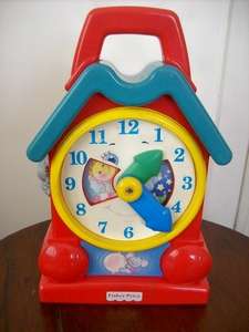 FISHER PRICE CLOCK.