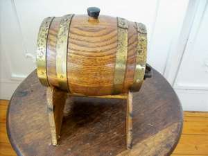 WINE BARREL SMALL.   NEEDS A GOOD CLEAN BRASS STRAPS.