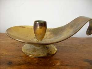 BRASS CANDLE HOLDER.  NEEDS A GOOD CLEAN.