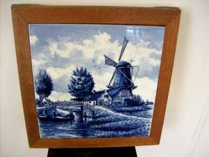 DUTCH TILE MOUNTED IN WOODEN FRAME.