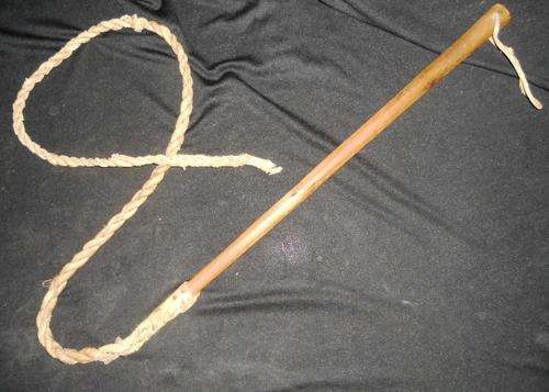 leather wip with wooden  handle