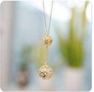 GOLD NECKLACE WITH TWO GOLD BALLS AND RHINESTONES