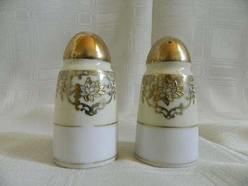 "Foreign" Salt and pepper shakers.  Excellent Condition