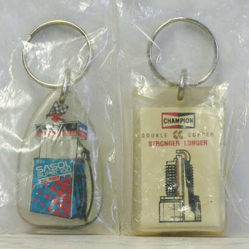 VINTAGE SASOL 100 AND CHAMPION SPARKPLUG KEYRINGS