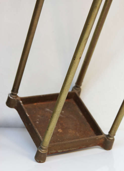 BRASS UMBRELLA/CANE STAND WITH HEAVY CAST IRON BASE