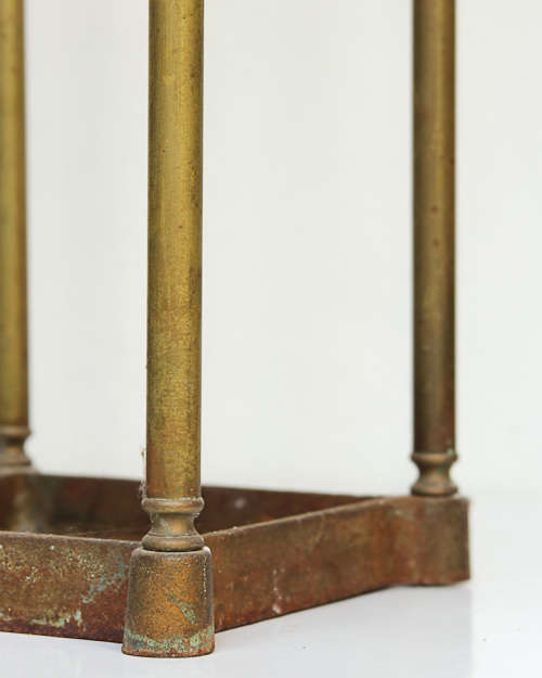 BRASS UMBRELLA/CANE STAND WITH HEAVY CAST IRON BASE