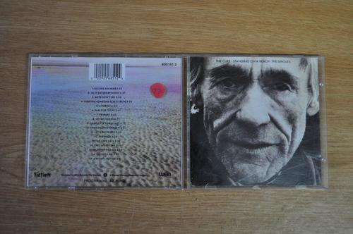 The Cure - Singles Standing on a Beach